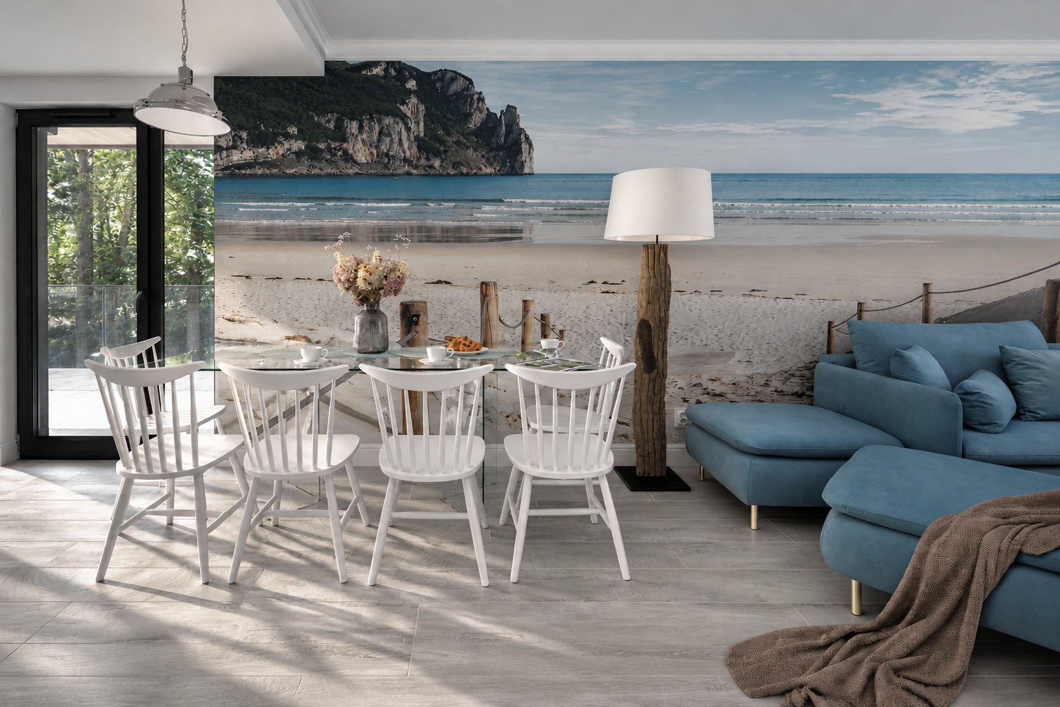 Jadalnia z nadmorską grafiką i błękitną sofą, Apartament Sea & Forest, Międzyzdroje